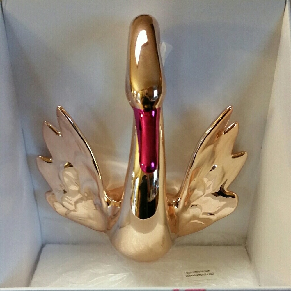 Rose gold swan